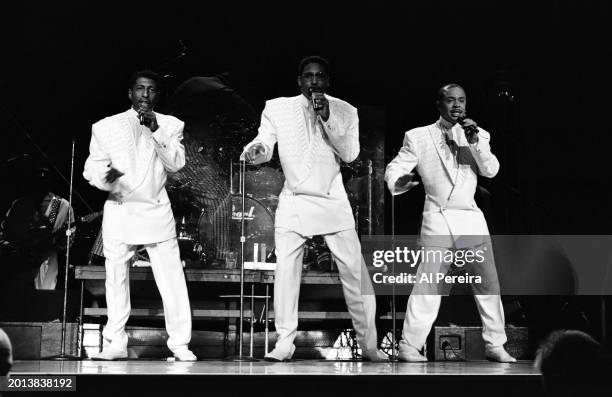 Group After 7 open when Whitney Houston performs at Madison Square Garden on her "I'm Your Baby Tonight World Tour" on July 23, 1991 in New York City.