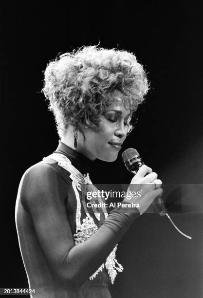 Whitney Houston performs at Madison Square Garden on her "I'm Your Baby Tonight World Tour" on July 23, 1991 in New York City.