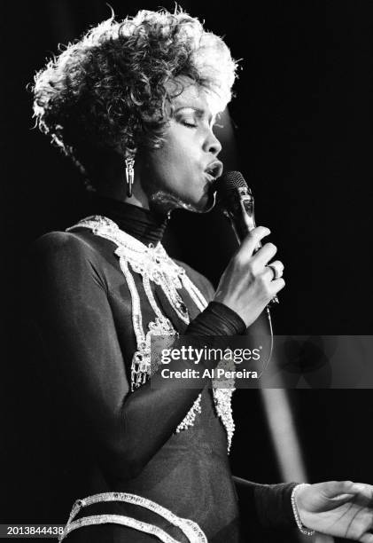 Whitney Houston performs at Madison Square Garden on her "I'm Your Baby Tonight World Tour" on July 23, 1991 in New York City.