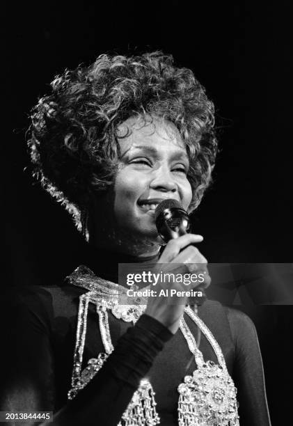 Whitney Houston performs at Madison Square Garden on her "I'm Your Baby Tonight World Tour" on July 23, 1991 in New York City.