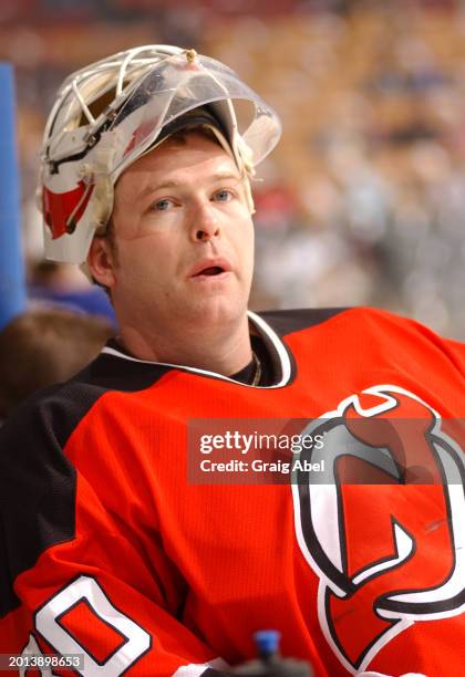 Martin Brodeur of the New Jersey Devils skates against the Toronto Maple Leafs during NHL game action on January 10, 2004 at Air Canada Centre in...