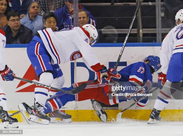 Blake Wheeler of the New York Rangers is injured during the first period on a check by Jayden Struble of the Montreal Canadiens at Madison Square...