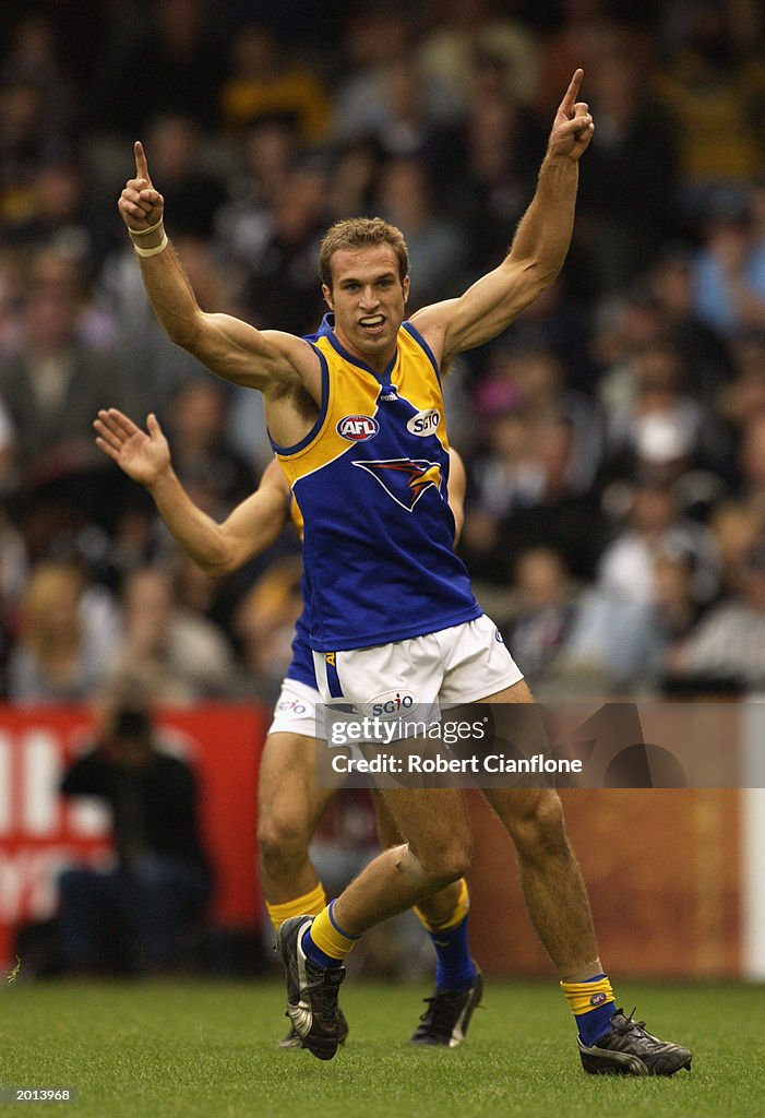 Chris Judd celebrates a goal