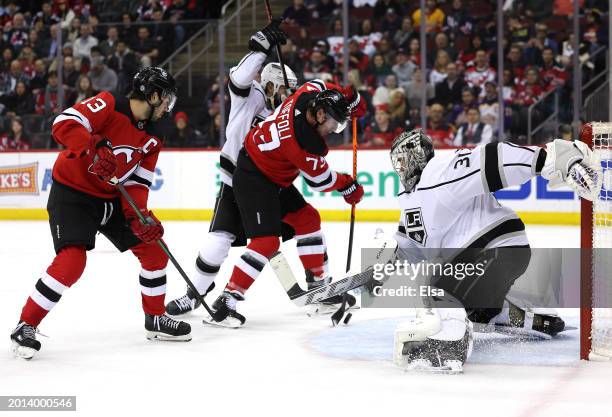 Tyler Toffoli of the New Jersey Devils scores on this play as David Rittich of the Los Angeles Kings is unable to make the save during the second...