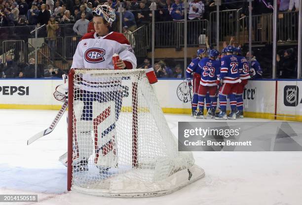 The New York Rangers celebrate a hattrick by Chris Kreider against Sam Montembeault of the Montreal Canadiens at Madison Square Garden on February...