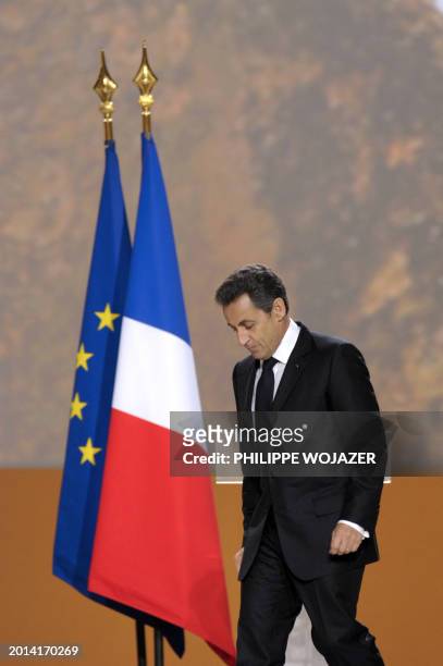 France's President Nicolas Sarkozy leaves the podium after he delivered a speech during the national homage in memory of poet, pioneer of the black...