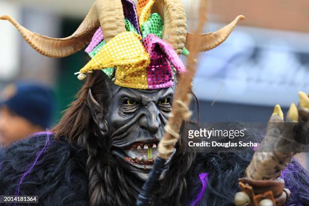 monster costume at the ethnic street parade - josip ilicic stock pictures, royalty-free photos & images