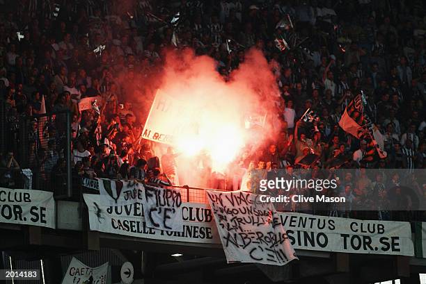 Juventus fans celebrate during the UEFA Champions League semi final, second leg match between Juventus and Real Madrid on May 14, 2003 at the Stadio...