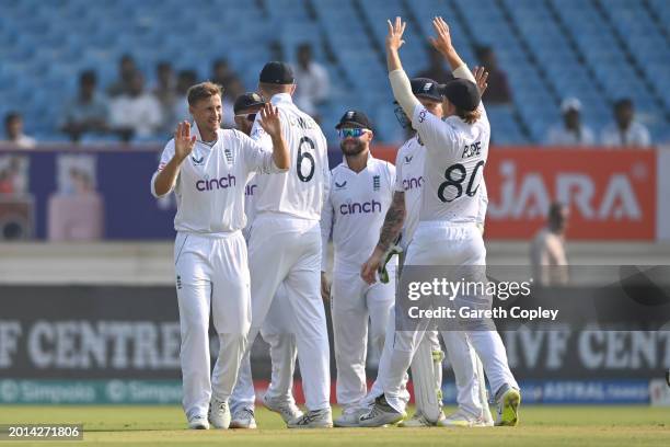 Joe Root of England celebrates dismissing Ravindra Jadeja of India during day two of the 3rd Test Match between India and England at Saurashtra...