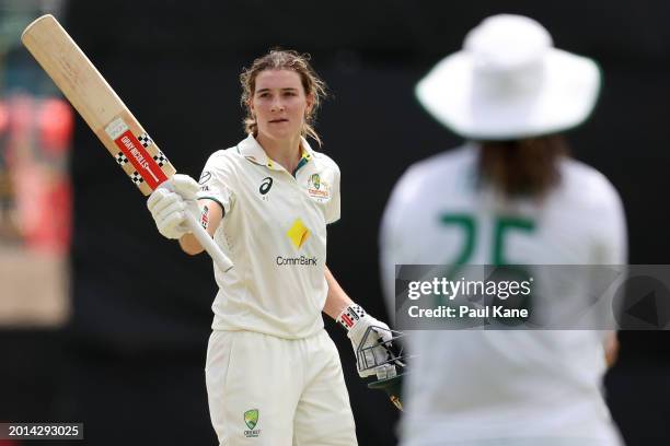 Annabel Sutherland of Australia celebrates her century during day two of the Women's Test match between Australia and South Africa at the WACA on...