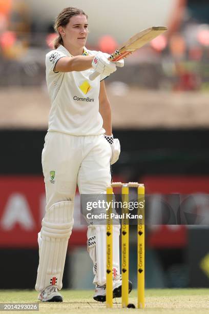Annabel Sutherland of Australia celebrates her century during day two of the Women's Test match between Australia and South Africa at the WACA on...