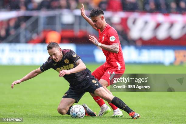 Jens Toornstra of FC Utrecht battles for the ball with Mees Hilgers of FC Twente during the Dutch Eredivisie match between FC Twente and FC Utrecht...