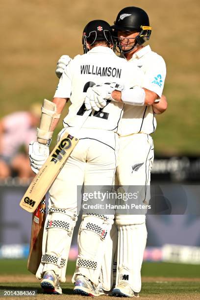 Will Young and Kane Williamson of the New Zealand Black Caps celebrate after winning the series during day four of the Men's Second Test in the...