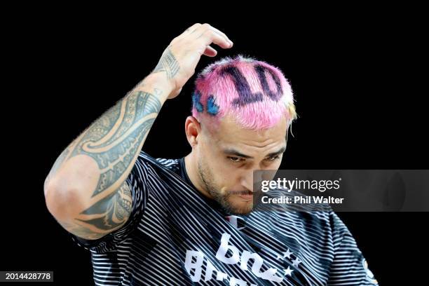 Dom Kelman-Potu of the New Zealand Breakers with the jersey number 10 for Tom Abercrombie painted in his hair during the round 20 NBL match between...
