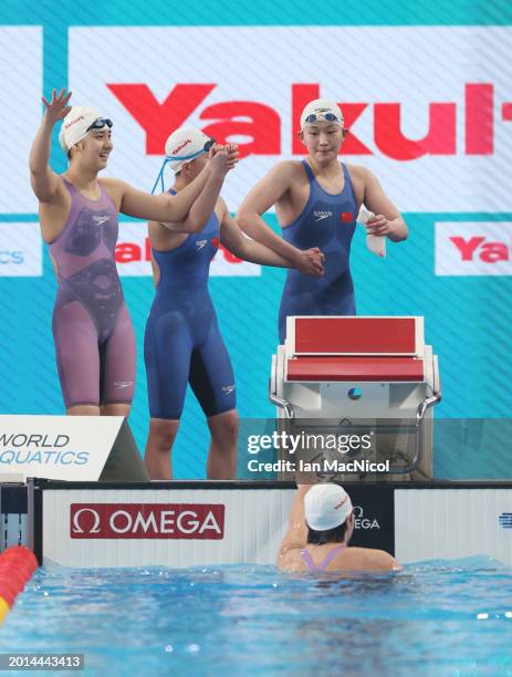 Yanhan Ai, Zhenqi Gong, Bingjie Li and Peiqi Yang of Team People's Republic of China react as they win gold in the Women's 4x200m Freestyle Final on...