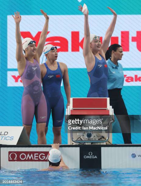 Yanhan Ai, Zhenqi Gong, Bingjie Li and Peiqi Yang of Team People's Republic of China react as they win gold in the Women's 4x200m Freestyle Final on...