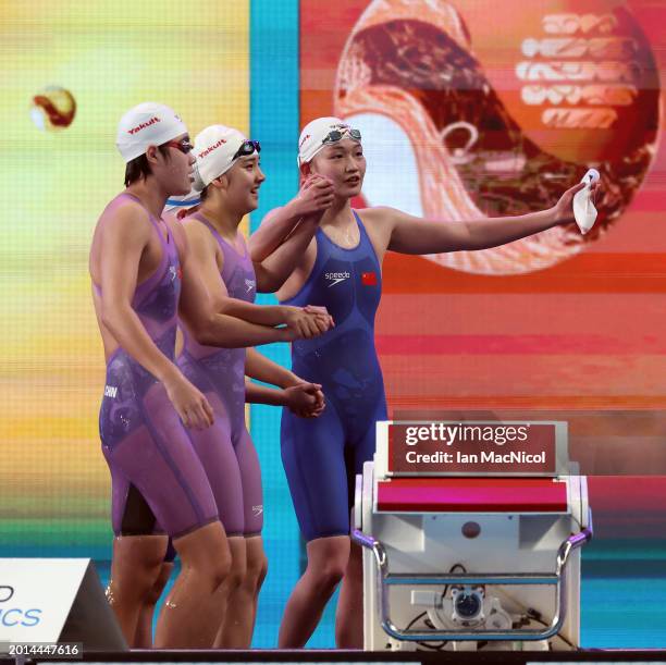 Yanhan Ai, Zhenqi Gong, Bingjie Li and Peiqi Yang of Team People's Republic of China react as they win gold in the Women's 4x200m Freestyle Final on...