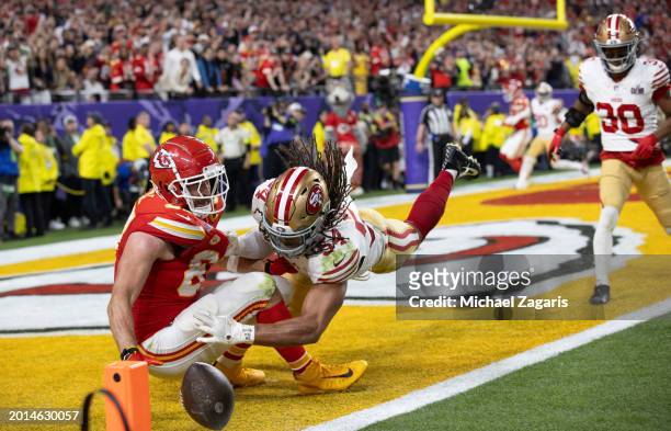 Fred Warner of the San Francisco 49ers breaks up a pass to Travis Kelce of the Kansas City Chiefs during Super Bowl LVIII at Allegiant Stadium on...