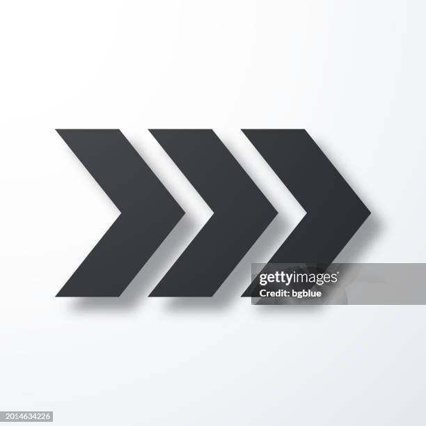 triple chevrons pointing right. icon with shadow on white background - 3 arrows stock illustrations