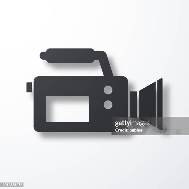 video camera. icon with shadow on white background - cameraman grey background stock illustrations