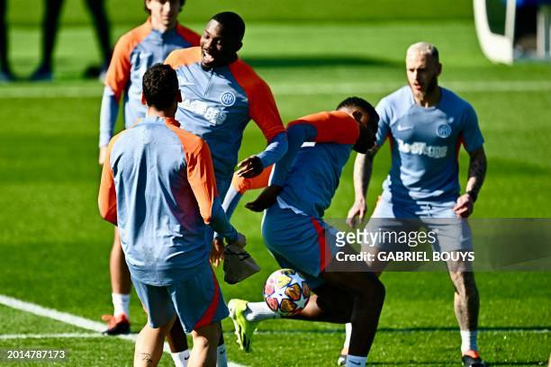 Inter Milan's French forward Marcus Thuram attends a training session with teammates on the eve of the UEFA Champions League last 16 first leg...