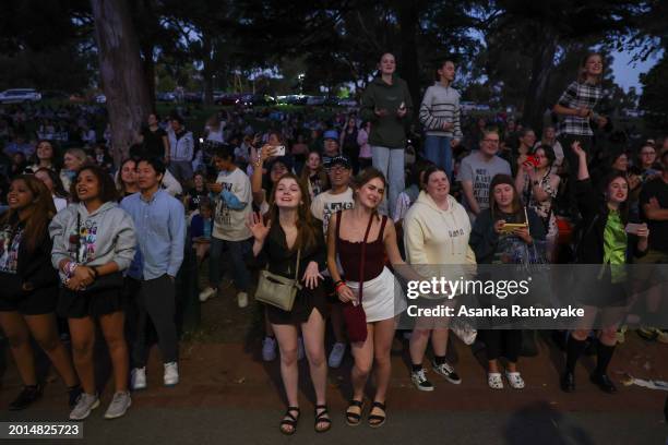 Taylor Swift fans, also known as "Swifties", with no tickets sing and dance during the concert outside the Melbourne Cricket Ground on February 16,...