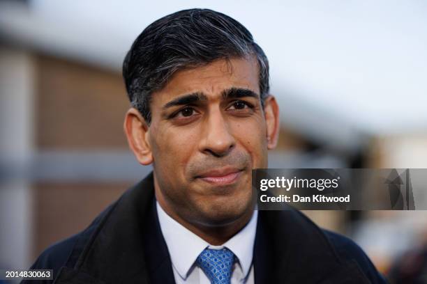 British Prime Minister Rishi Sunak looks on during a media visit to Harlow Police Station in Essex on February 16, 2024 in Harlow, United Kingdom.