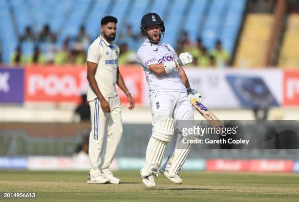 England batsman Ben Duckett celebrates as he reaches his century during day two of the 3rd Test Match between India and England at Saurashtra Cricket...