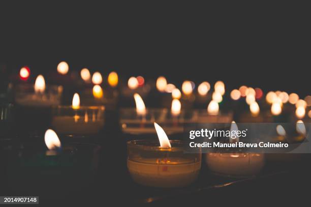 burning candles - birthday candle on black stock pictures, royalty-free photos & images