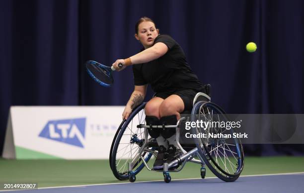 Rugby Bishop of Great Britain competes against Zoe Maras of France during the Bolton Indoor ITF3 Wheelchair Tennis Tournament at Bolton Arena on...