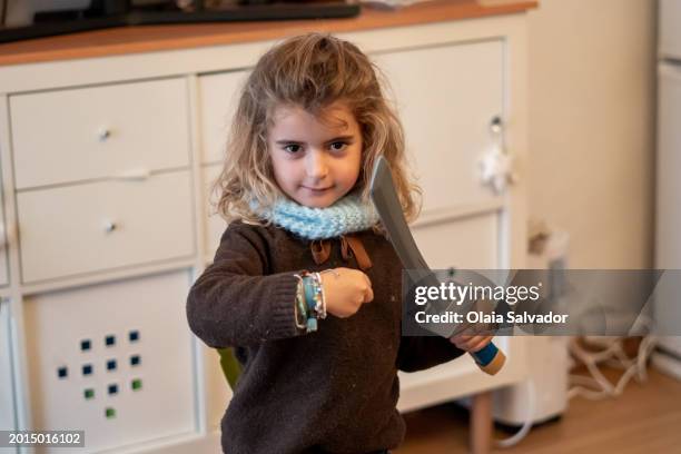 a child is playing with a sabre - ninja sword stock pictures, royalty-free photos & images
