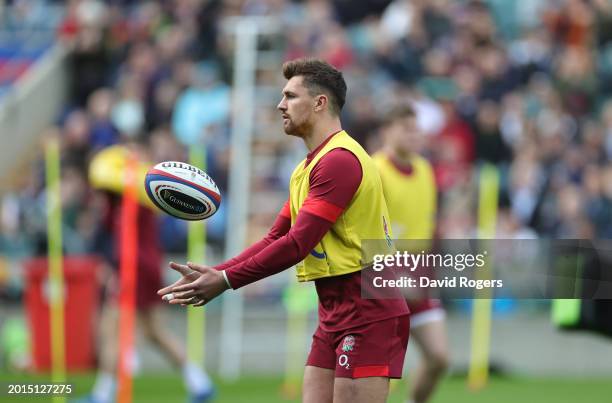 Henry Slade catches the ball during the England Open training session held at Twickenham Stadium on February 16, 2024 in London, England.