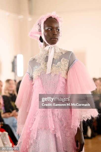 Model walks the runway at the Bora Aksu show during London Fashion Week February 2024 on February 16, 2024 in London, England.