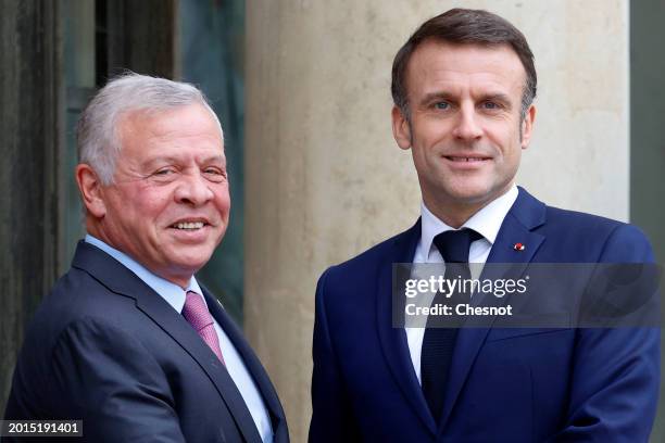 French President Emmanuel Macron welcomes King Abdullah II of Jordan prior to a working lunch at Elysee Presidential Palace on February 16, 2024. At...