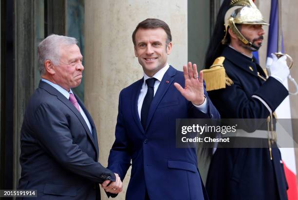 French President Emmanuel Macron welcomes King Abdullah II of Jordan prior to a working lunch at Elysee Presidential Palace on February 16, 2024. At...