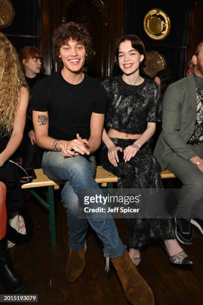 Bobby Brazier and Delphi Primrose attend the Edward Crutchley show during London Fashion Week February 2024 at Ironmongers Hall, Barbican on February...