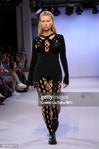 Lottie Moss walks the runway at the Sinead O'Dwyer show during London Fashion Week February 2024 at the BFC NEWGEN Show Space on February 16, 2024 in...