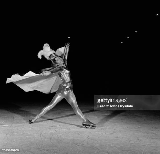 French figure skater Jacqueline du Bief leaping in the air during practice at Wembley Empire Pool Skating Rink, London, January 1956. Du Bief is...