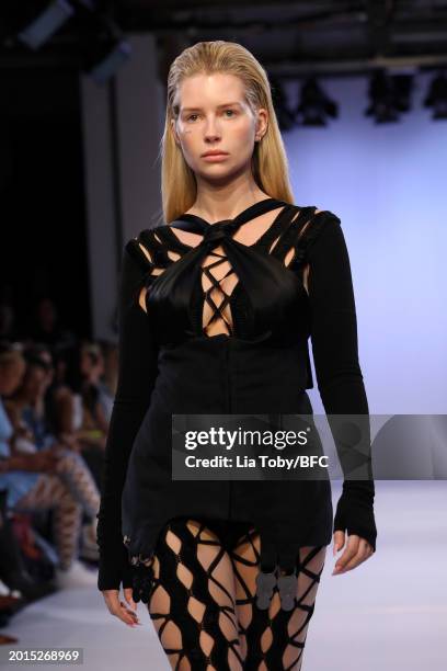 Lottie Moss walks the runway at the Sinead O'Dwyer show during London Fashion Week February 2024 at the BFC NEWGEN Show Space on February 16, 2024 in...