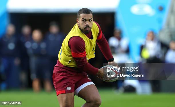 Ollie Lawrence runs with the ball during the England Open training session held at Twickenham Stadium on February 16, 2024 in London, England.