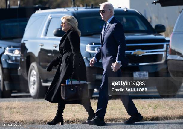 President Joe Biden and First Lady Jill Biden walk to board Marine One prior to departure from Gordons Pond State Park in Rehoboth Beach, Delaware,...