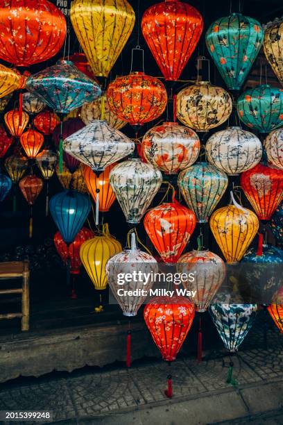 colorful traditional lanterns hanging in asian street market. - lanterna cinese foto e immagini stock