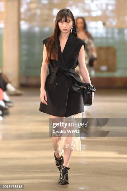 Model on the runway at Marques'Almeida RTW Fall 2024 as part of London Ready to Wear Fashion Week held at The Truman Brewery on February 19, 2024 in...