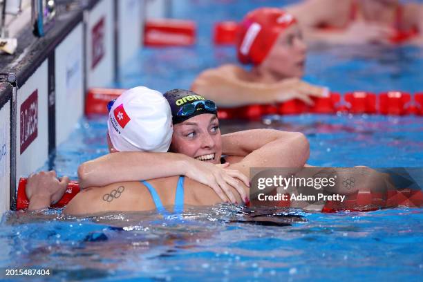Marrit Steenbergen of Team Netherlands is congratulated by Silver Medalist, Siobhan Bernadette Haughey of Team Hong Kong after winning gold in the...