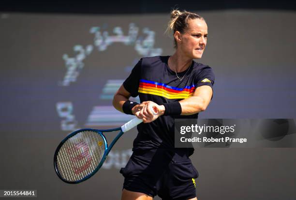 Arantxa Rus of the Netherlands in action against Victoria Azarenka in the first round on Day 2 of the Dubai Duty Free Tennis Championships, part of...