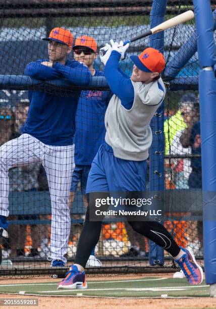 New York Mets infielder Brett Baty takes swings in the team's batting cage during a spring training workout on February 15 in Port St. Lucie, Florida.