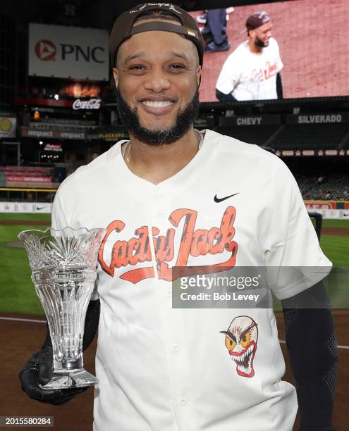 Robinson Cano with the Home Run Derby trophy at the Cactus Jack HBCU Celebrity Softball Classic on February 15, 2024 in Houston, Texas.