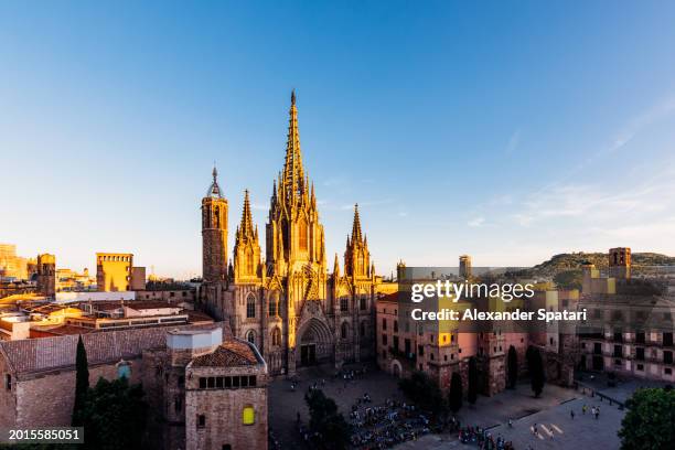 barcelona cathedral and barcelona skyline at sunset, catalonia, spain - barcelona cathedral stock pictures, royalty-free photos & images