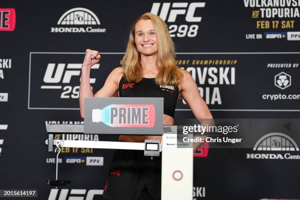 Andrea Lee poses on the scale during the UFC 298 official weigh-in at the Hyatt Regency Irvine on February 16, 2024 in Irvine, California.