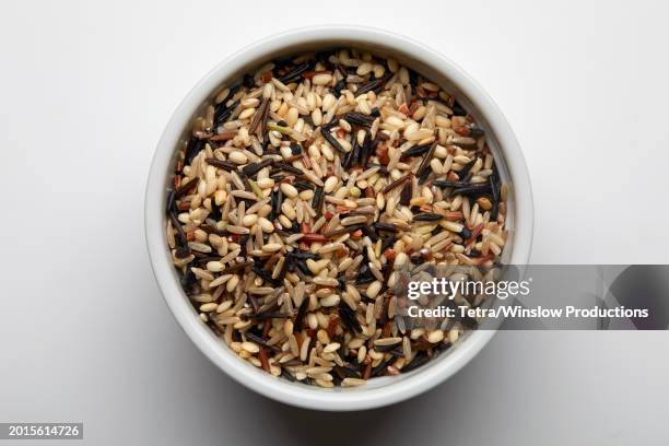 overhead view of basmati rice in bowl - rice bowl above stock pictures, royalty-free photos & images